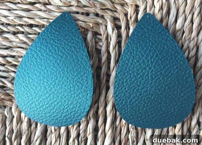 Crafting Chic Faux Leather Earrings 5 Faux leather earring shapes freshly cut from Cricut