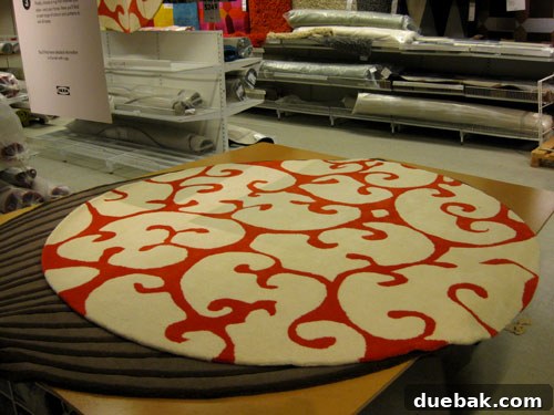 My Ikea Habit: Always Browsing, Rarely Buying 17 Bold orange-swirled circle rug from IKEA, a stunning room focal point
