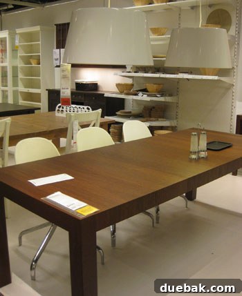 My Ikea Habit: Always Browsing, Rarely Buying 10 IKEA dining room with oversized white pendants over a Parson's table and curvy chairs
