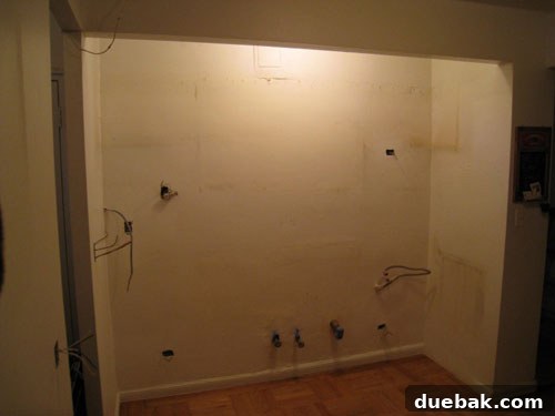 Gutted kitchen space, stripped down and ready for the renovation and new cabinetry installation