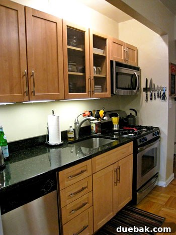 After photo 2: Modern NYC kitchen with granite countertops and efficient layout