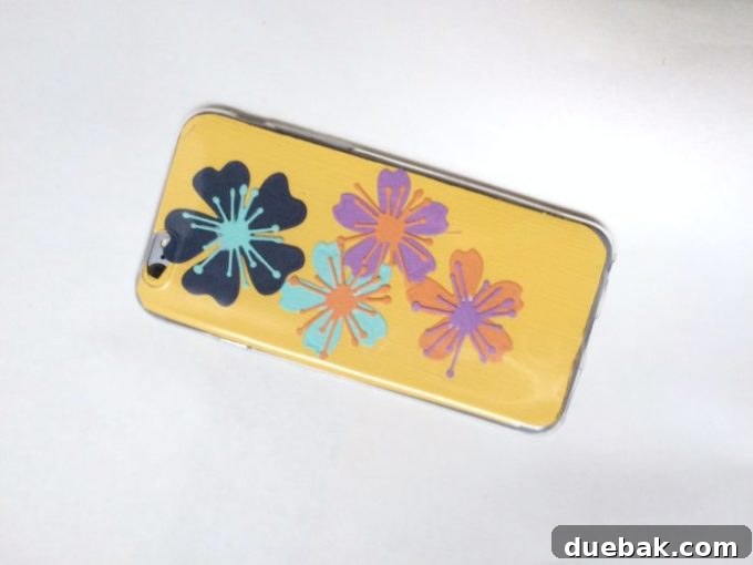Side view of a personalized iPhone case, highlighting the snug fit and detailed paper flower design
