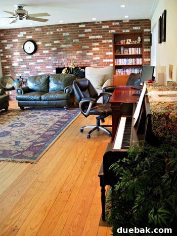 Close-up of Amy's living room before makeover, showing existing furniture and decor