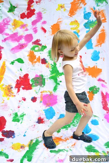 Clara in a dynamic, playful pose, possibly dancing or making a dramatic exit