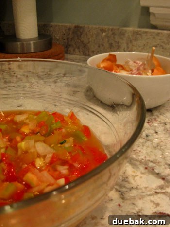 Homemade Salsa Crafting Kit 4 A bowl of freshly chopped vegetables for homemade salsa, showcasing vibrant colors and fresh textures.