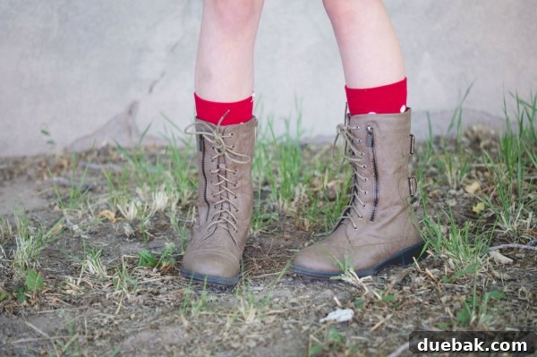 Ways to add personality to a school uniform. Style an outfit with cute boots.