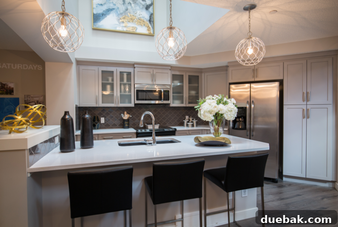 Stylish kitchen island with white Caesarstone countertop
