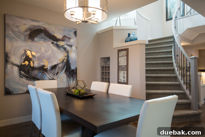 Grand curved stairwell in a modern luxury home