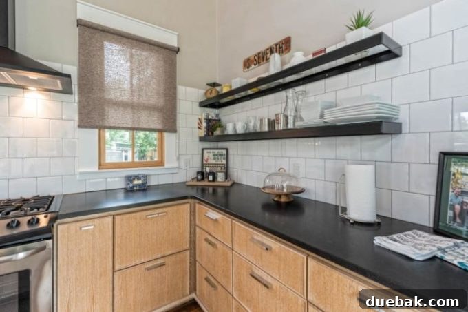 Close-up of kitchen shelving and decor in the Fixer Upper Shotgun House