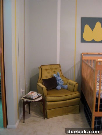 DIY Fabric Lamp Shade Makeover 2 Nursery corner before swing arm lamp installation, showing empty wall space next to a nursing chair.