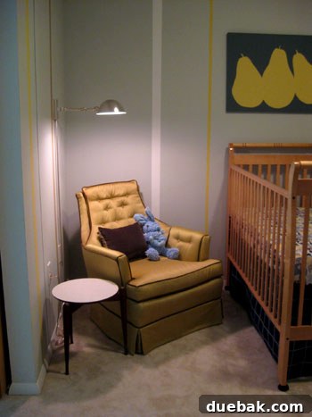 DIY Fabric Lamp Shade Makeover 3 Nursery corner after swing arm lamp installation, lamp extended over nursing chair.