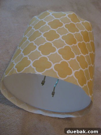 DIY Fabric Lamp Shade Makeover 7 Fabric panel cut and ready to be wrapped around the lampshade.