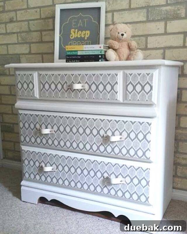 Completed dresser with new paint and decorative contact paper