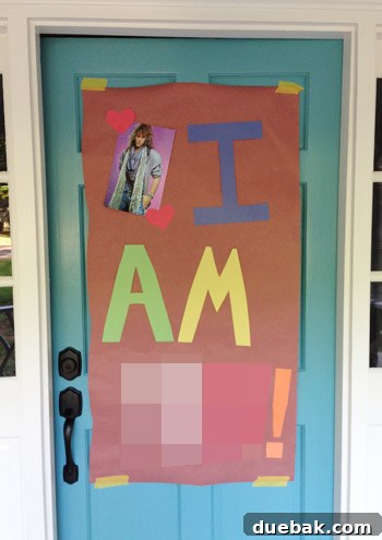 Birthday sign with blurred age and an 80s Bon Jovi picture