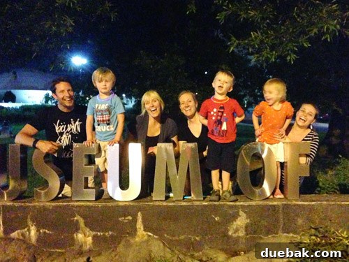 Family members making funny faces while waiting for fireworks
