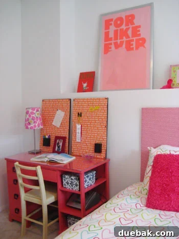 A beautifully decorated pink bedroom for a young girl after the transformation