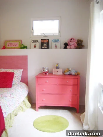 Close-up of Olivia's updated pink room, showing decor details