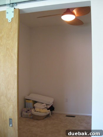 Another angle of the guest room before its nursery transformation