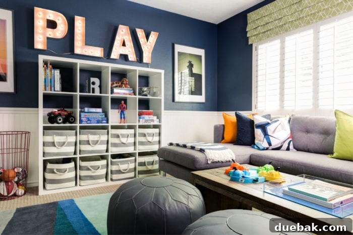 Whimsical Playroom Designs for Endless Fun 8 A family room thoughtfully designed to include a dedicated playroom area, blending seamlessly into the living space with custom built-ins and a child-friendly rug, by JandJDesign.