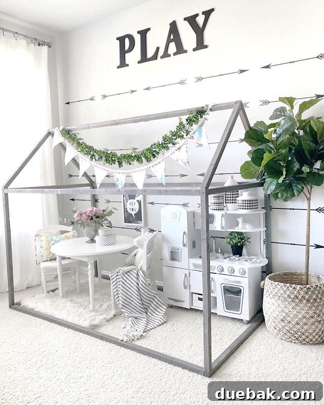 Whimsical Playroom Designs for Endless Fun 9 A chic playroom design from My Texas House, showcasing modern aesthetics, thoughtful organization, and a bright, inviting atmosphere for children.