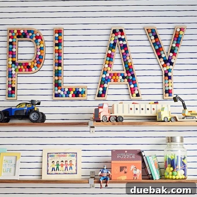 Whimsical Playroom Designs for Endless Fun 14 A stylish playroom designed with a contemporary aesthetic, blending comfort and fun through carefully selected furniture and decor, by Kate Decorates originally from JandJdesign.