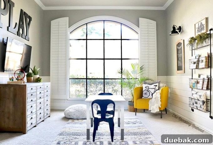 Whimsical Playroom Designs for Endless Fun 16 A bright and cheerful playroom showcasing thoughtful design elements and ample space for active play and creative exploration, from The Rambling Redhead.
