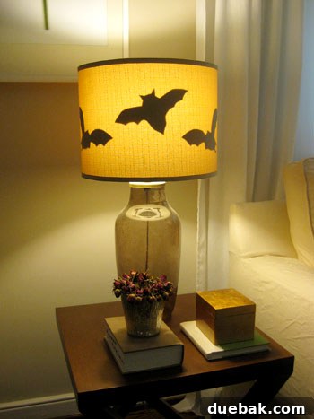 Black bat silhouette taped inside a lampshade