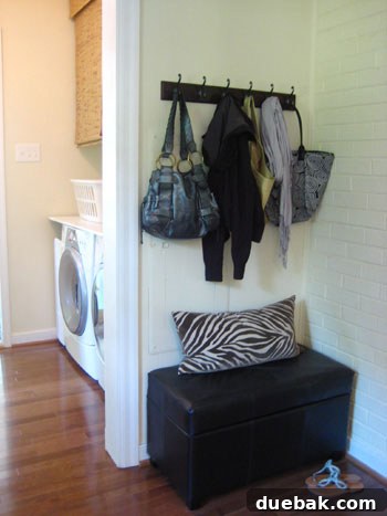 Mini mudroom area with a zebra print pillow