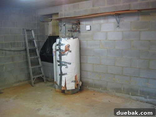 Mastering Cinderblocks: Oil-Based Drylok for Mildew Prevention and Sealing 4 Drylok Applied on Basement Walls