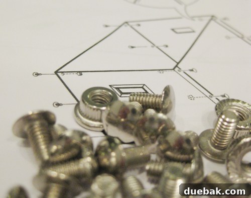 Close-up of IKEA Kassett box instructions and screws
