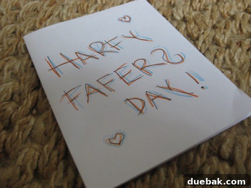 Homemade 'Harfy Fafers Day' card from Burger, with a charmingly misspelled greeting, hinting at exciting news.