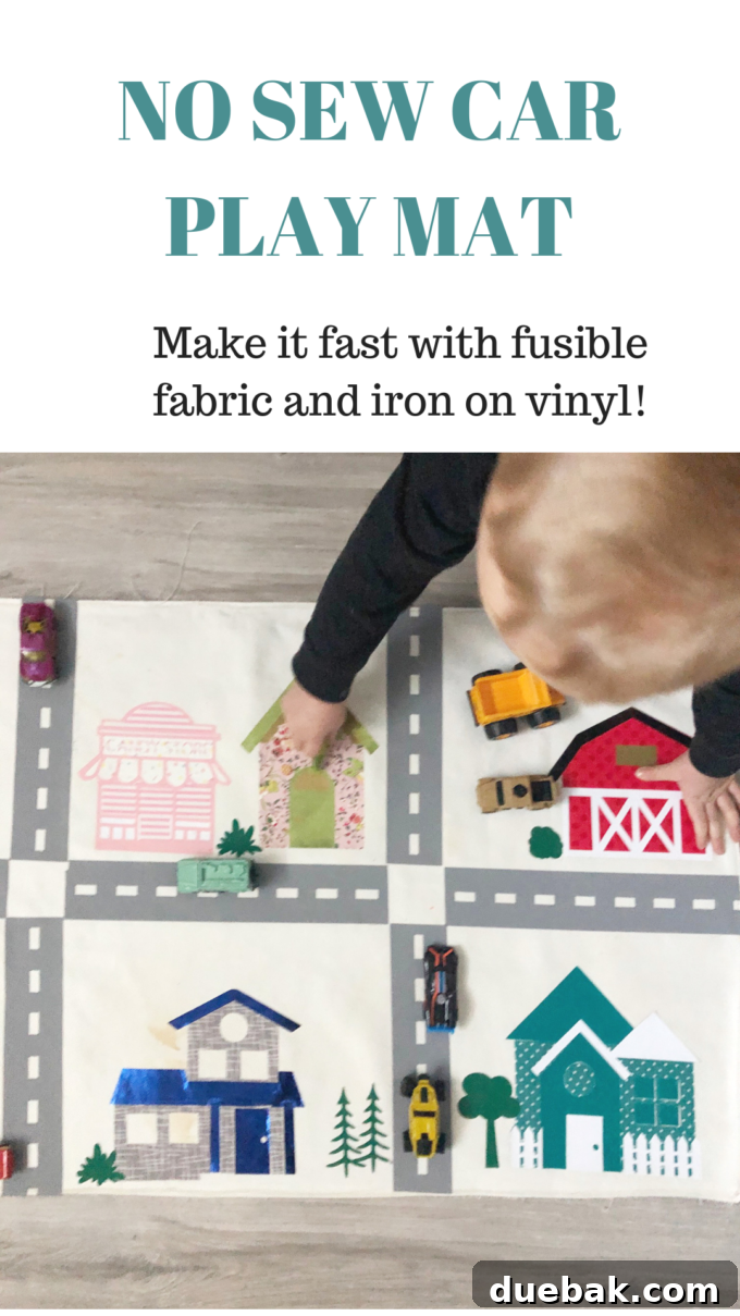 Build Your Own Adventure Car Play Mat with Cricut Maker 8 Vertical shot of a completed car play mat with various buildings, roads, and trees, ideal for child's play.