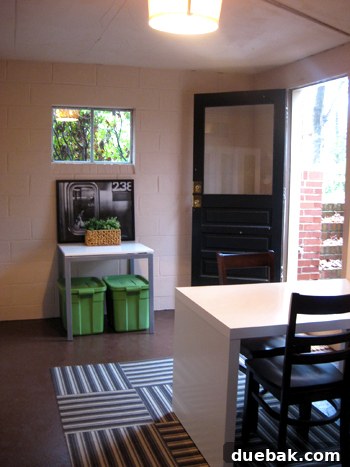 Dress Up Your Glass Doors with Gift Wrap 20 Organized basement with green storage bins and updated decor