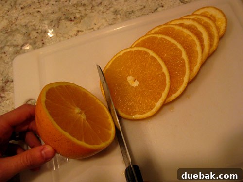 Crafting Radiant Dried Orange Ornaments 5 Close-up of thinly sliced oranges and lemons, demonstrating the ideal thickness for drying into ornaments.