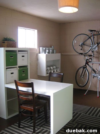 Basement room showing various DIY projects, including the frosted window