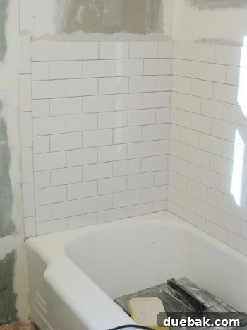 Stolen Conversations 4 Subway tile installation around bathtub