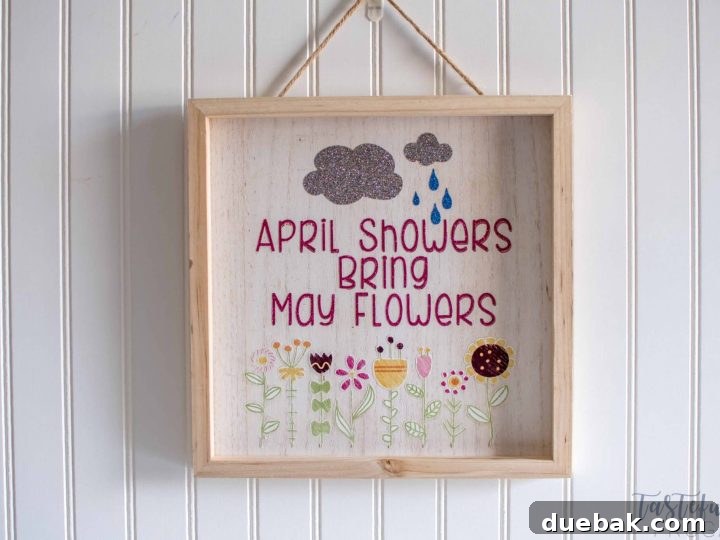 A charming wood sign decorated with iron-on vinyl, perfect for spring decor, inspired by Tastefully Frugal.