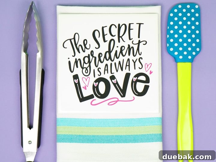 A creative DIY gift idea: tile trivet decorated with iron-on vinyl, inspired by Happiness is Homemade.