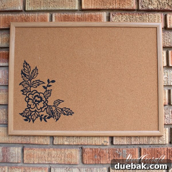 A creative corkboard decorated with iron-on vinyl, showcasing a fun design, ideal for a college dorm room.