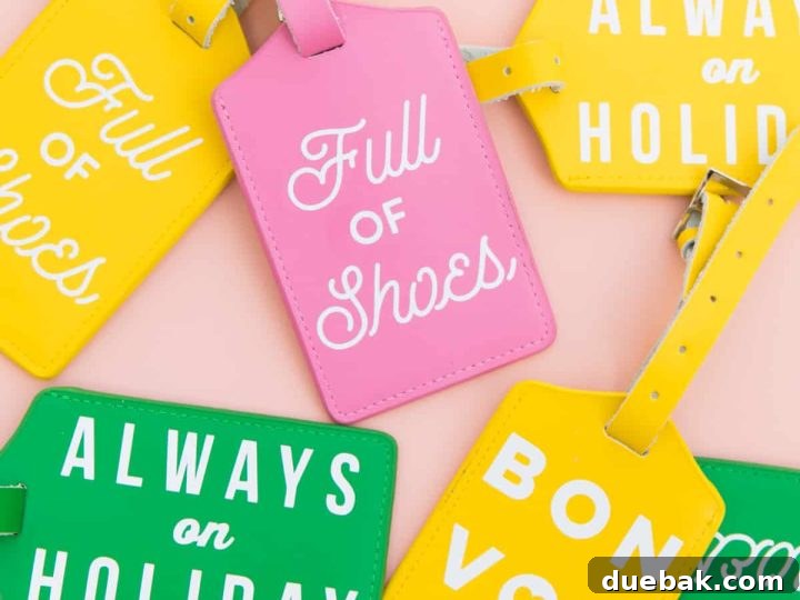 Stylish DIY typographic luggage tags made with durable iron-on vinyl, perfect for travel.
