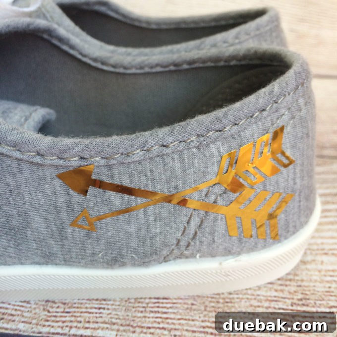 DIY personalized shoes customized with iron-on vinyl, featuring a simple yet unique design.