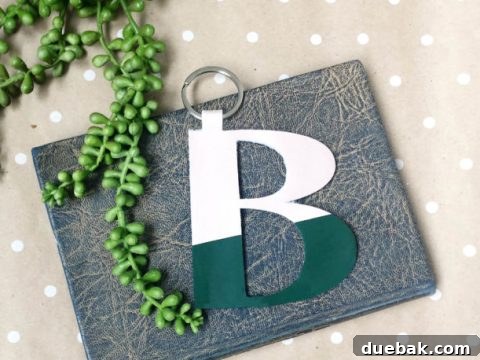 DIY leather monogram charms crafted with iron-on vinyl for personalized accessories.