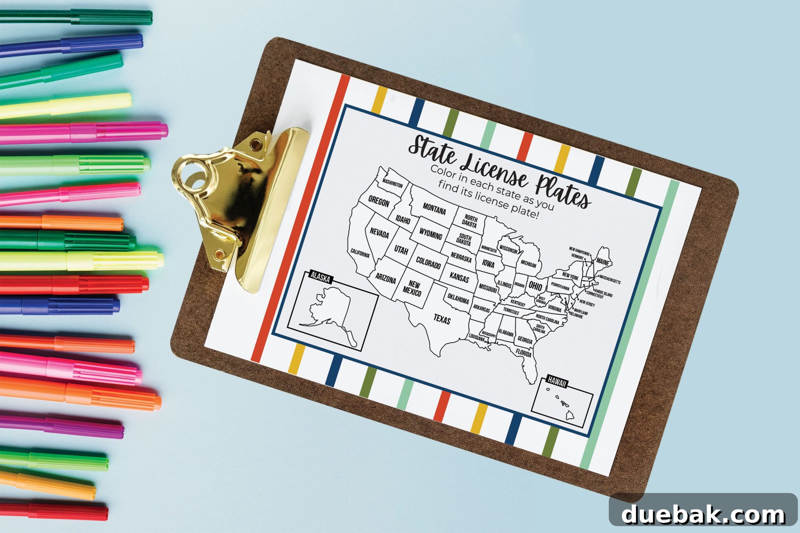 Close-up of a child using the Canadian province checklist from the printable license plate game.