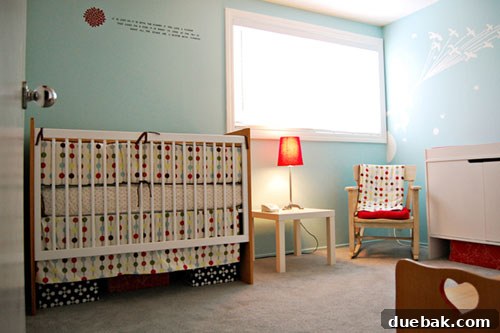 Vibrant Red and Sky Blue Nursery Decor 3 After image of a beautifully decorated, gender-neutral nursery