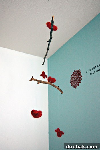 Vibrant Red and Sky Blue Nursery Decor 5 Another view of the nursery showing the crib and wall art
