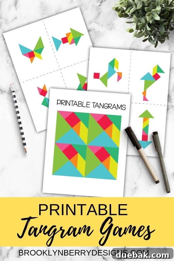 A child's hands holding a printed tangram sheet before cutting, ready for assembly.