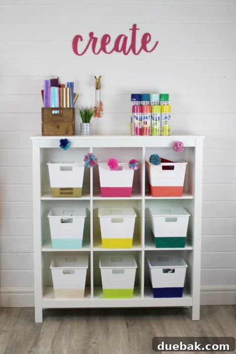 Close-up of craft supplies, including spray paint cans, organized by color in an appealing display.