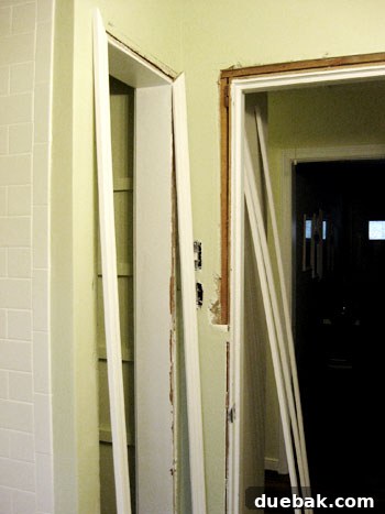 Elevate Your Bathroom Renovation with Flawless Baseboard and Trim Installation 14 Linen closet and door frame before trim installation, showing raw edges.