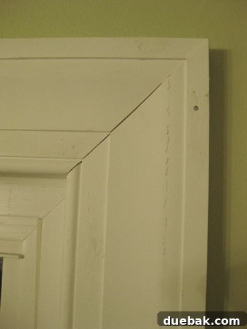 Elevate Your Bathroom Renovation with Flawless Baseboard and Trim Installation 10 Installed window trim before any caulking or painting, showing slight gaps.