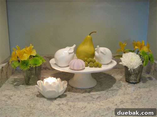 Close-up of budget flowers and faux fruit arrangement, ready for spring with a vibrant touch